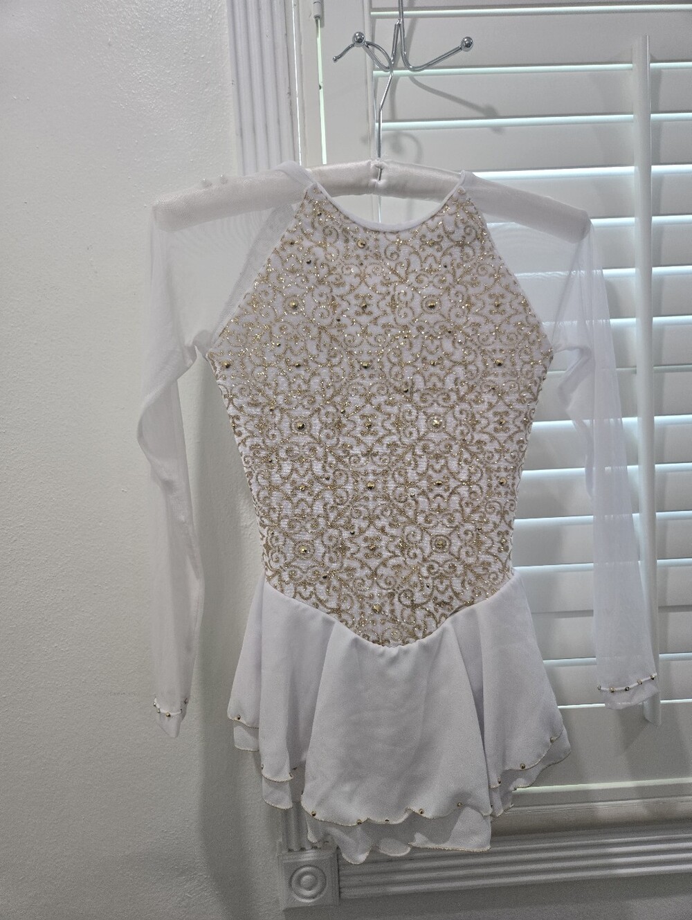 Embellished White Long-Sleeve Figure Skating Dress with Gold Accents